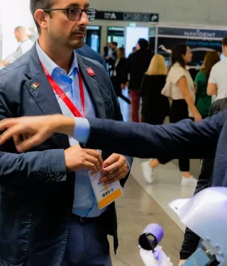 Nobel Biocare 2023 EAO physicians reviewing technology