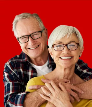 Nobel Biocare all-on-4 patients embracing each other